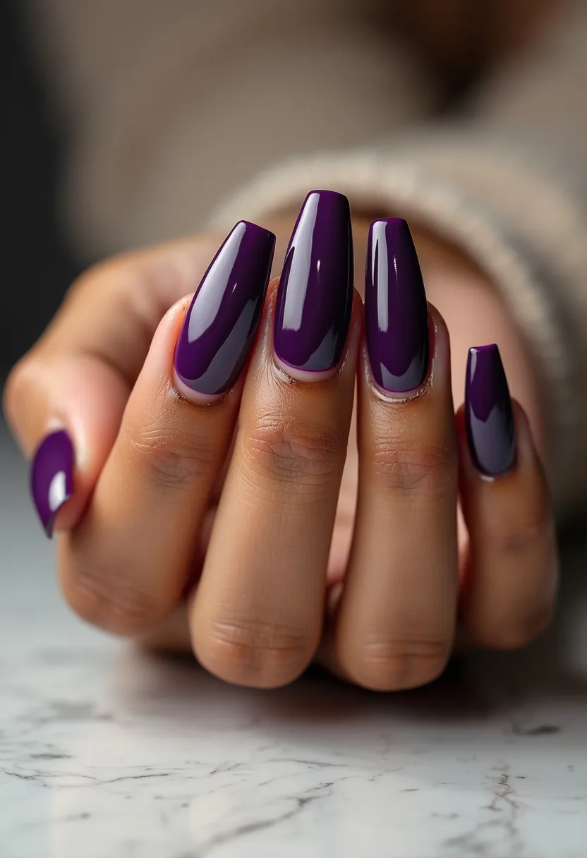 The  nail  design  features  purple  nail  polish  with  a  shiny  finish,  giving  the  nails  a  glossy  appearance.  The  nails  are  long  and  have  a  pointed  shape,  which  is  a  popular  style  for  nail  art. The  nail  design  is  simple  and  elegant,  suitable  for  everyday  wear  or  special  occasions.