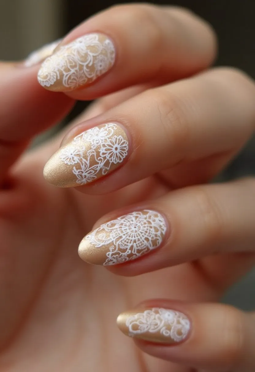 The nail design features a soft, shimmering champagne-gold nail polish as the base color, complemented by intricately detailed white lace patterns adorning each nail. The nails are shaped in an elegant almond form, which contributes to their sophisticated appearance. The lace designs vary slightly from nail to nail, showcasing floral and mandala-like motifs that add depth and interest. This design appears to be created using gel, given the smooth, glossy finish and the durability required for such precise decorations. The overall aesthetic is delicate and refined, making this nail design suitable for a bridal occasion or other formal event, seamlessly blending classic elegance with modern detail.