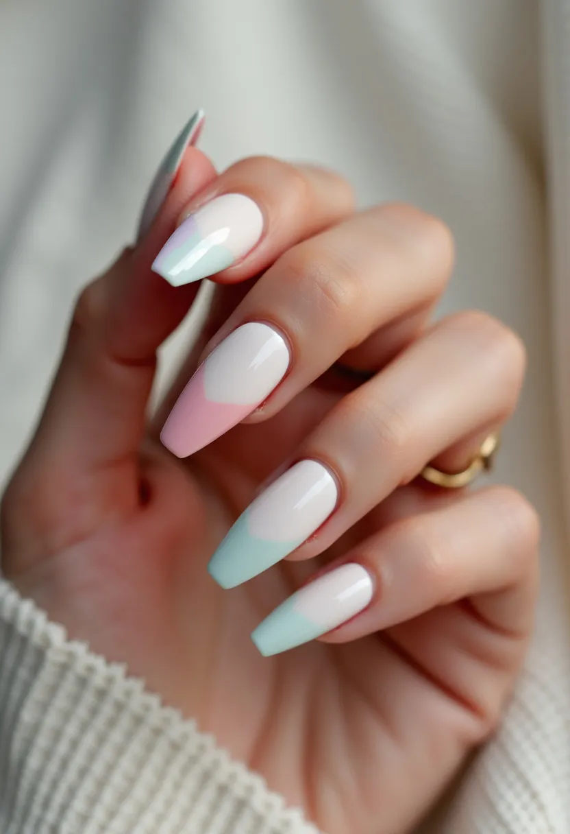 The  nail  design  features  a  white  base  with  a  pink  and  blue  accent.  The  nails  are  shaped  in  a  square  shape,  and  they  are  painted  with  a  pink  and  blue  gradient.  The  nail  treatment  appears  to  be  a  gel  or  acrylic,  as  it  has  a  smooth  and  polished  finish.  The  design  is  simple  and  elegant,  suitable  for  everyday  wear  or  special  occasions.