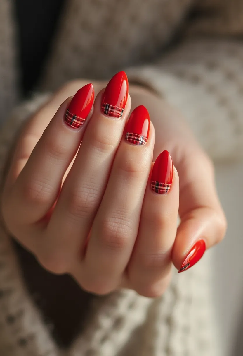 The nail design features a vibrant red color palette, perfect for a bold and festive look. The nails are shaped in an almond style, enhancing their elegant and feminine appearance. Each nail has a detailed plaid pattern near the cuticle area, crafted with black, white, and a hint of red to complement the base color. This intricate design is likely achieved through gel or shellac treatment, offering a glossy finish and durability. The plaid detail suggests a seasonal theme, possibly autumn or winter, making it suitable for holiday celebrations or special occasions. The overall design combines classic elegance with a playful, modern touch.