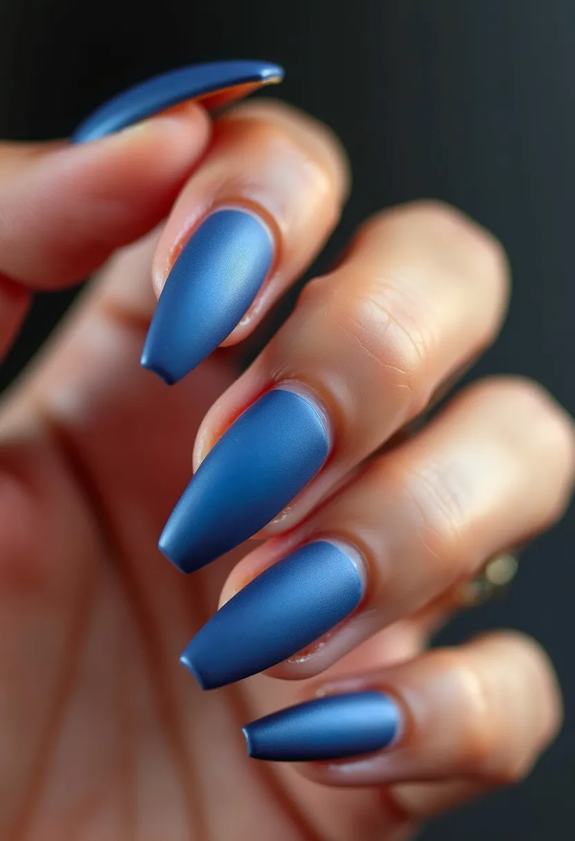 This nail design features a monochromatic blue color palette with a matte finish. The nails are long and shaped into a stiletto style, tapering to a sharp point. The design is clean and devoid of any additional patterns or decorations, focusing on the bold color and finish. The coating appears to be a gel treatment, providing a smooth, even layer that emphasizes the matte effect. This versatile look is elegant and suitable for various occasions, adding a sophisticated touch to any outfit.