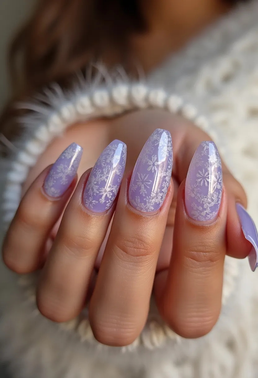 The nail design features a soft lavender color palette with a glossy finish, likely utilizing a gel nail treatment for durability and shine. The nails are shaped into a stylish almond shape, giving them an elegant and elongated appearance. Intricate white snowflake patterns are delicately painted across each nail, adding a touch of winter charm. The detailed snowflake designs suggest a seasonal theme, perfect for the winter months or holiday season. The overall look combines sophistication with a festive flair, making it suitable for special winter occasions.