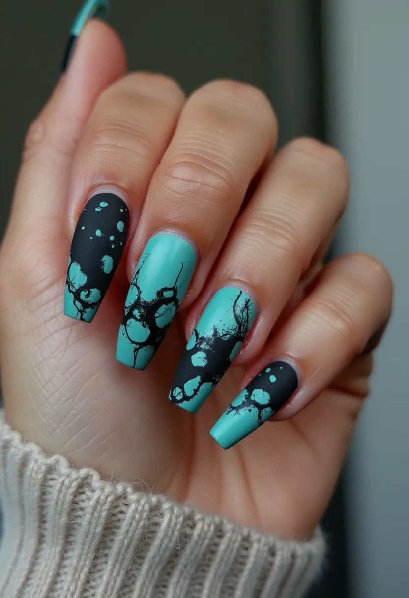 The nail design showcases a captivating blend of turquoise and black hues on long, coffin-shaped nails. The turquoise base is adorned with intricate black splatter patterns, creating an artistic, edgy look. The finish appears to be matte, suggesting the possibility of a gel nail treatment. This striking design features a modern, abstract theme, perhaps suitable for artistic events or a bold everyday statement. The combination of the vibrant turquoise and contrasting black gives it a versatile yet unique appeal.