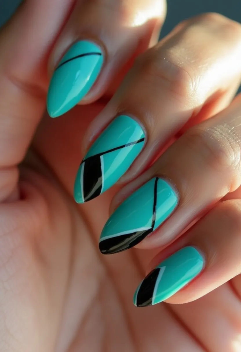 The nail design showcases a vibrant, turquoise color palette with a glossy finish, indicative of a gel or shellac treatment. The nails are almond-shaped, providing a chic and elongated look. The design features intricate, geometric patterns created by black lines and sections, complemented by white accents. These linear and color-block elements add a modern and artistic touch to the overall appearance. The pattern complexity and the vibrant color make this design suitable for a variety of occasions, from casual outings to special events, and may be particularly fitting for summer with its bright, fresh aesthetic.