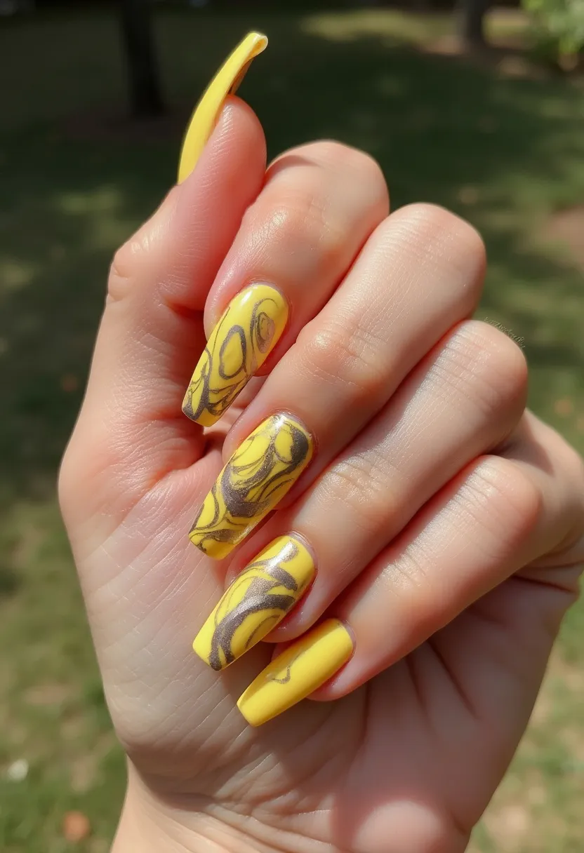 The nail design showcases a vibrant and eye-catching color palette, predominantly featuring a bright yellow base. Each nail is shaped into a long, squared-off tip, contributing to a bold and stylish appearance. The intricate patterns on the nails are characterized by abstract swirls and flowing lines in a contrasting dark brown shade, resulting in a marbled effect that adds depth and complexity to the design. The high-gloss finish suggests a gel nail treatment, ensuring durability and a professional look. This striking manicure is perfect for those looking to make a statement, and its sunny color palette could be particularly fitting for a summer theme or a special occasion like a vibrant, outdoor event.